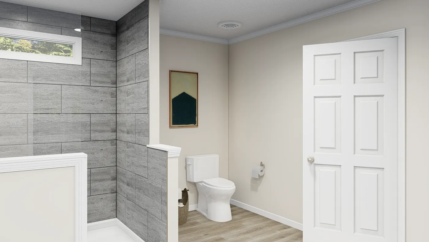 The PALMETTO 6101 Primary Bathroom. This Manufactured Mobile Home features 4 bedrooms and 2.5 baths.