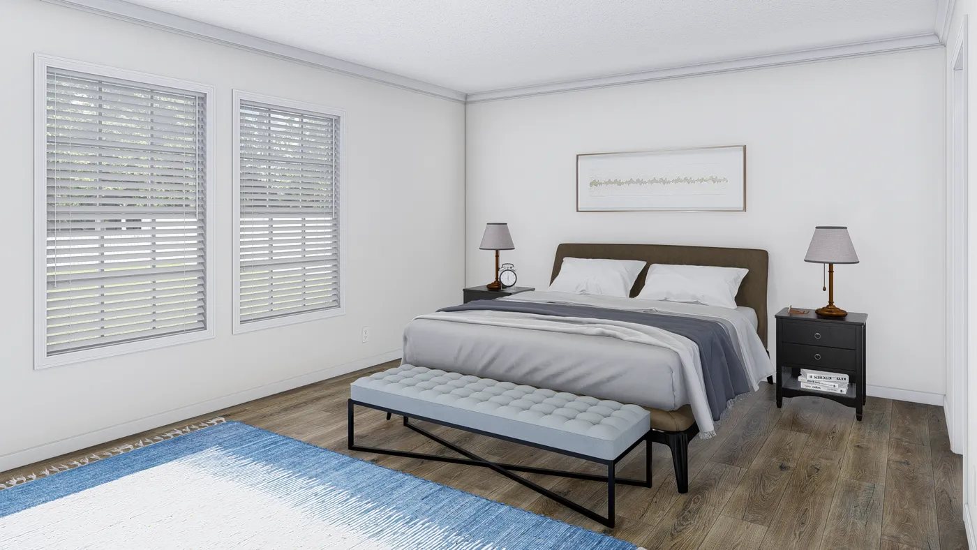 The BIG EASY M001 Primary Bedroom. This Manufactured Mobile Home features 4 bedrooms and 2 baths.